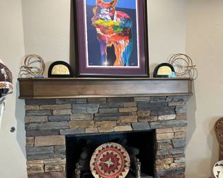 John Nieto Wolf print, Egyptian bookends, Pima baskets.