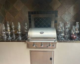 And a collection of Manganese kerosine lamps with a beautiful lilac cast to the glass.