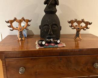 Flame stitch mahogany pillar and scroll dresser circa 1840, Lethoso pottery candlesticks, and tribal mask.