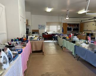 We have a three car garage with appliances, kitchenalia, office supplies, tvs and electronics, luggage and more.