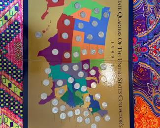 We have a complete 50 State commemorative quarter collection.