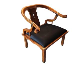 One of a pair of JAMES MONT Asian inspired horse shoe chairs with leather seat