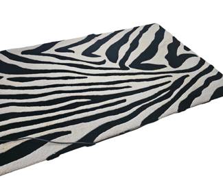 One of two ZEBRA striped area rugs