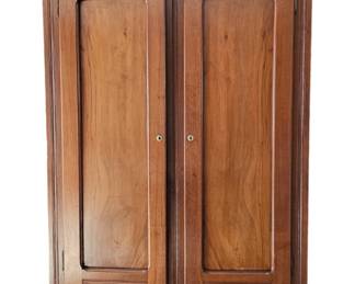 Gorgeous Antique Walnut Armoire. Two doors, two drawers.  Shelved inside for storage.  Comes apart for moving.