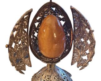 Faberge style egg with detailed filegree hinged case