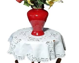 A Lovely Little Wood Side Table Topped With A Crisp Linen Table Cloth & Colorful Floral Arrangement