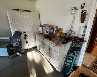 That work Bench/Cabinet is on wheels and moves EASILY! Four Drawers and four cupboards! 