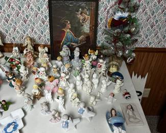 The last two tables in the basement are filled with vintage to contemporary Christmas! 