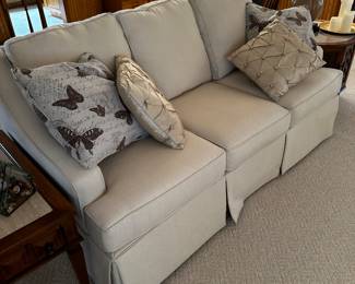 This is a beautiful light gray upholstered sofa! Impossibly comfortable and in MINT LIKE NEW CONDITION!