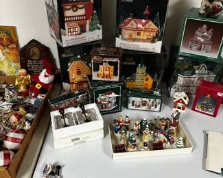 The last two tables in the basement are filled with vintage to contemporary Christmas! 