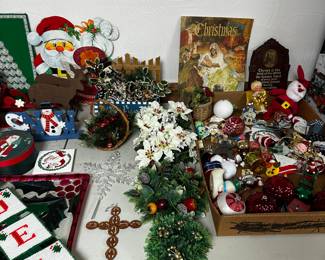 The last two tables in the basement are filled with vintage to contemporary Christmas! 