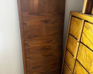 Here is the third of THREE MCM Bedroom Sets we have! This beauty is a LANE Furniture FIVE piece solid oak bedroom suite! 1 Queen Size Bed (No Box spring or mattress) 6 drawer tall boy dresser, 9 drawer long dresser with mirror and a 1 drawer night stand! NEAR MINT CONDITiON!