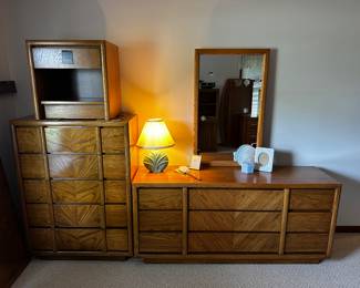 Here is the third of THREE MCM Bedroom Sets we have! This beauty is a LANE Furniture FIVE piece solid oak bedroom suite! 1 Queen Size Bed (No Box spring or mattress) 6 drawer tall boy dresser, 9 drawer long dresser with mirror and a 1 drawer night stand! NEAR MINT CONDITiON!