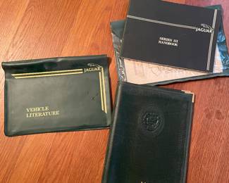 Vtg Jaguar handbooks and leather cover