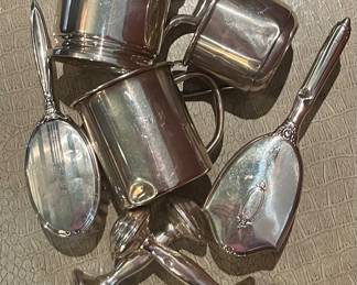 1950s sterling silver baby cups, brushes and rattles.