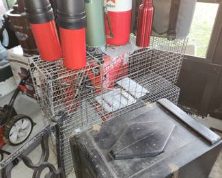 Thermos - Animal Traps - Vintage Trunk - RTC Cooler - She Collected Marlboro Items you will see alot throughout the house.  She quite smoking 10 years ago!