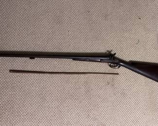 1790-1830 Flintlock Musket 
Mfg. William Moore - London
Double Barrel 10gauge muzzle loader
Walnut Stock
Scroll Engravings 
Works Great. Needs the metal cleaned