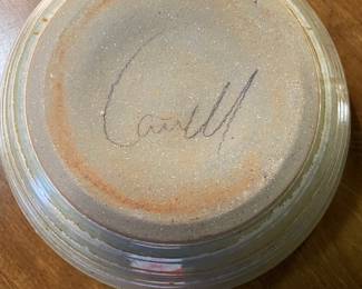 Signature on bottom of large pottery bowl