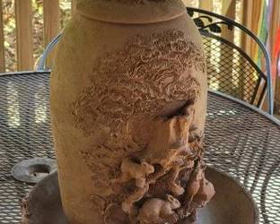 Pottery bird water feeder