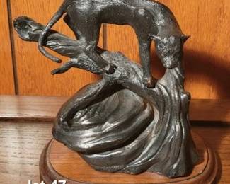 Signed bronze statue