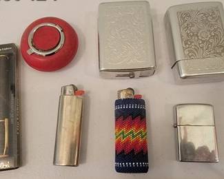 Vintage lighters, cigarette cases