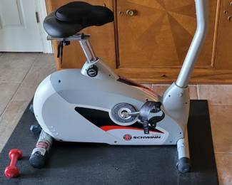 Exercise bike, candle holders, decorative vase