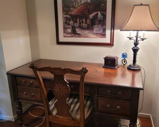 office desk, lamp, art