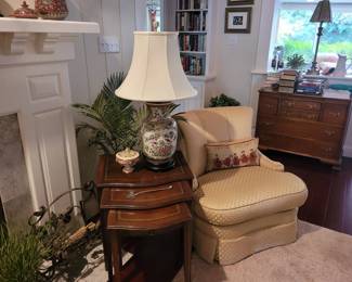 nesting tables , lots of table lamps , accent chair 