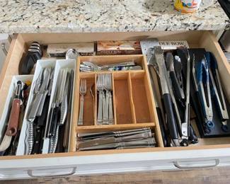 Full set Oneida 18/10 Stainless with serving utensils. Two sets of tongs, misc. kitchen tools.