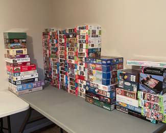 Lots of puzzles some new in box