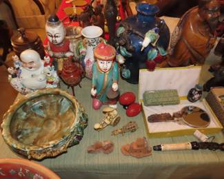 Tables of Asian pieces.