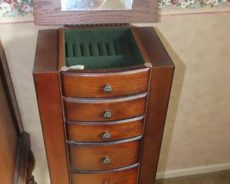 Free standing jewelry chest.