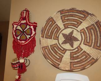 Horse bridle and woven basket.