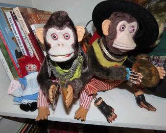 Mechanical battery operated clapping monkeys.