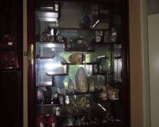 Cherry wall curio cabinet.