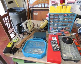 Drills, socket sets, mitre saw, screws/nails storage, wrenches, stud finders, hammers, screwdrivers.