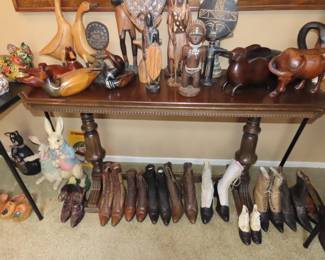 Antique shoes and African figures. Ducks, geese and buffalo.
