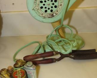 Antique hair dryer and curling iron.