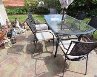 Patio table, chairs and umbrella.