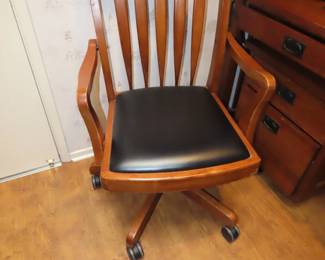 Two matching desk chairs.