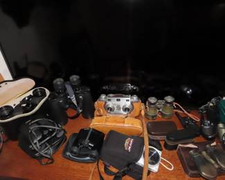 Selection of binoculars and cameras