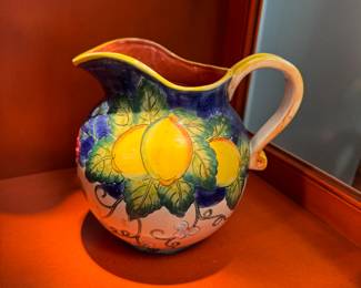 Ceramic hand-painted pitcher with lemons, has a hairline spider crack 7"H