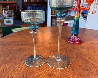 Blue and gold decorated glass pillar candle holders, tallest is 12"