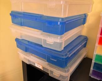 Clear and blue storage boxes, will fit 12" x 12" paper