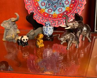 Grouping of small items including resin and porcelain elephants, panda, vase 1/2-2"