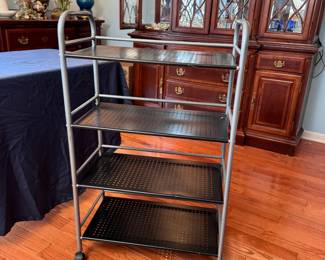 Tubular metal cart with pierced shelving on casters 42"H x 24"W x 14"D