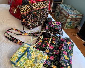 Vera Bradley 16"W red duffle bag and a variety of purses with some wear 