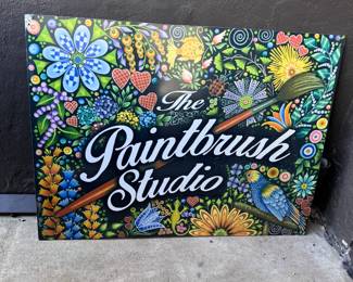 Double-sided large 'The Paintbrush Studio' sign, sturdy print over what appears to be wood, heavy sign, artwork by Linda Conner 36" x 48"