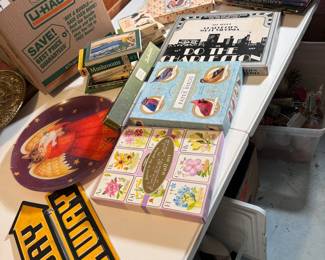 Box Lot#89 small books, metal my way sign, alphabet cards, recorder, Charleston, WV game