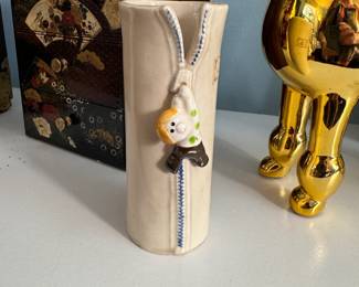 Fitz and Floyd ceramic vase/toothbrush holder with boy hanging from zipper 5"H